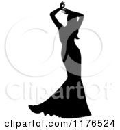 Clipart Of A Silhouetted Bride In A Mermaid Gown Holding Her Arms Above Her Head Royalty Free Vector Illustration by Pams Clipart