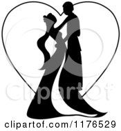 Poster, Art Print Of Black Silhouetted Wedding Couple Dancing Over A Heart