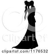Clipart Of A Black And White Silhouetted Wedding Couple Dancing Closely Royalty Free Vector Illustration