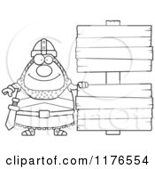 Cartoon Of A Black And White Happy Knight By Wooden Signs Royalty Free Vector Clipart