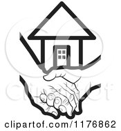 Black And White Young Hand Holding A Senior Hand With A House