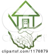 Green Young Hand Holding A Senior Hand With A House