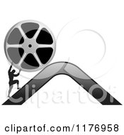 Poster, Art Print Of Silhouetted Man Pushing A Film Reel Over A Mountain