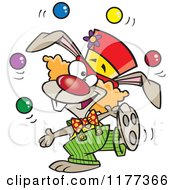 Cartoon Of A Juggling Funny Bunny Clown Royalty Free Vector Clipart