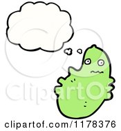 Cartoon Of A Green Microbe With A Conversation Bubble Royalty Free Vector Illustration