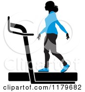 Poster, Art Print Of Silhouetted Woman In A Blue Outfit Walking On A Treadmill