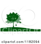 Green Silhouetted Boy On A Tree Swing On A Hill Over White