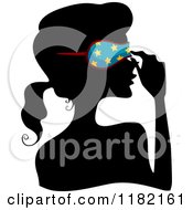 Black Silhouetted Woman Adjusting A Blue Starry Sleep Mask