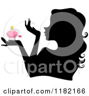 Poster, Art Print Of Black Silhouetted Woman Holding A Pink Perfume Bottle