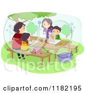 Poster, Art Print Of Happy Family Coloring On A Picnic Table
