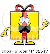 Cartoon Of A Smart Yellow Gift Box Mascot With An Idea Royalty Free Vector Clipart