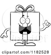 Cartoon Of A Black And White Smart Gift Box Mascot With An Idea Royalty Free Vector Clipart