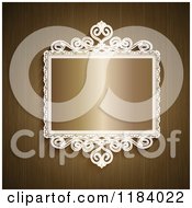 Clipart Of An Ornate White Frame With Shiny Gold On Wood Royalty Free Vector Illustration