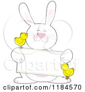 Poster, Art Print Of Happy White Easter Bunny Holding A Sign With Two Chicks