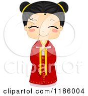 Cute Chinese Girl In A Traditional Cheongsam
