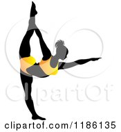 Poster, Art Print Of Silhouetted Woman In An Orange Outfit Doing The Natarajasana Yoga Pose