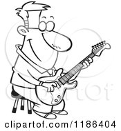 Cartoon Of A Black And White Happy Man Playing A Guitar On A Stool Royalty Free Vector Clipart by toonaday