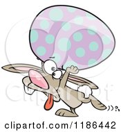 Cartoon Of A Tired Easter Bunny Carrying A Big Egg Royalty Free Vector Clipart