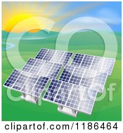 Solar Panels In A Hilly Landscape With A Stream And Sunset