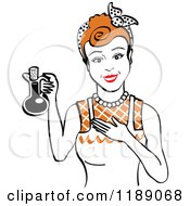 Happy Retro Redhead Woman In An Apron Holding Up A Bottle Of Cooking Oil