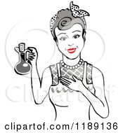 Happy Retro Gray Haired Woman In An Apron Holding Up A Bottle Of Cooking Oil