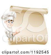 Poster, Art Print Of Happy Young Male Chef Pointing To A Scroll Menu Sign