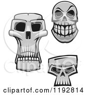Clipart Of Grayscale Monster Skulls Royalty Free Vector Illustration