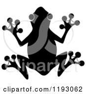 Cartoon Of A Black Silhouetted Frog Royalty Free Vector Clipart