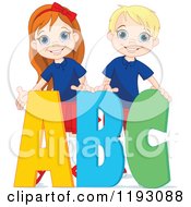 Happy School Boy And Girl With Abc Alphabet Letters