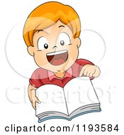 Happy Red Haired Caucasian Boy Pointing To And Holding Up A Book