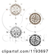 Clipart Of Black And Brown Compass Roses Royalty Free Vector Illustration