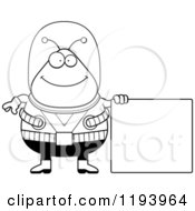Cartoon Of A Black And White Happy Chubby Alien Standing By A Sign Royalty Free Vector Clipart