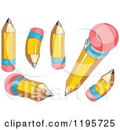 Cartoon Of Yellow Pencils With Eraser Tips Royalty Free Vector Clipart by Pushkin