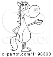 Cartoon Of An Outlined Horse Standing And Presenting Royalty Free Vector Clipart