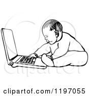 Clipart Of A Black And White Baby Using A Laptop Royalty Free Vector Illustration