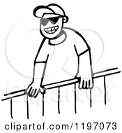 Clipart Of A Black And White Boy Grinning Over A Fence Royalty Free Vector Illustration