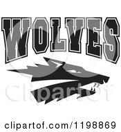 Clipart Of Black And White WOLVES Team Text Over A Wolf Head Royalty Free Vector Illustration