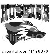 Clipart Of Black And White HUSKIES Team Text Over A Mascot Dog Royalty Free Vector Illustration by Johnny Sajem
