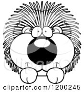 Cartoon Of A Black And White Cute Happy Porcupine Over A Surface Or Sign Royalty Free Vector Clipart
