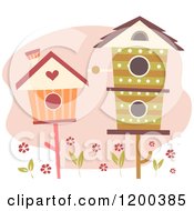 Cartoon Of Cute Retro Bird Houses Over Flowers And A Pink Cloud Royalty Free Vector Clipart