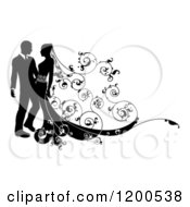 Clipart Of A Black And White Silhouetted Wedding Couple With Ornate Swirls Royalty Free Vector Illustration by AtStockIllustration