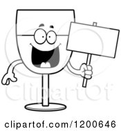 Cartoon Of A Black And White Happy Wine Glass Character Holding A Sign Royalty Free Vector Clipart