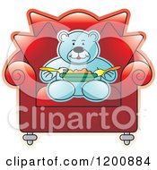 Blue Teddy Bear Eating In A Red Chair