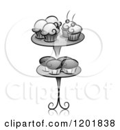 Clipart Of Grayscale Cupcakes On A Stand Royalty Free Vector Illustration by BNP Design Studio