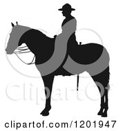 Poster, Art Print Of Black And White Silhouetted Man Mounted On Horseback