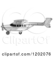 Clipart Of A Small Silver Light Airplane 7 Royalty Free Vector Illustration