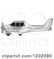 Clipart Of A Small Silver Light Airplane 2 Royalty Free Vector Illustration