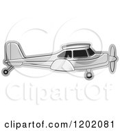 Clipart Of A Small Silver Light Airplane 3 Royalty Free Vector Illustration