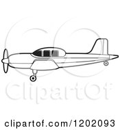 Clipart Of A Small Black And White Outlined Airplane 6 Royalty Free Vector Illustration