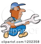 Black Worker Man Running With A Giant Wrench